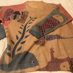 NEW…Yesno cool graphic print sweater.. very soft and Large